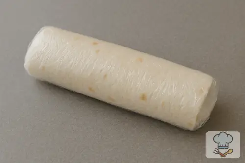 Фото 5-го шага: Рулет из лаваша с крабовыми палочками и кукурузой